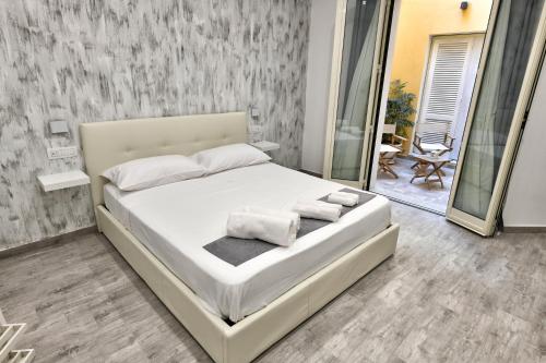 Un pat sau paturi într-o cameră la VL Central Room