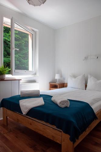 Llit o llits en una habitació de Willa Monti
