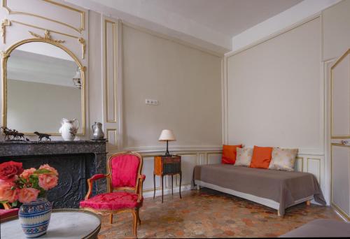 Ένα ή περισσότερα κρεβάτια σε δωμάτιο στο Au vieux Château