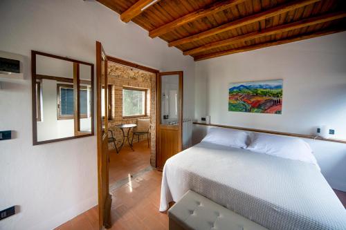 Tempat tidur dalam kamar di Albergo Fontanelle