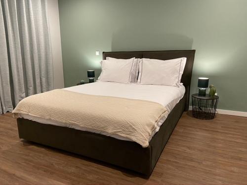 Кровать или кровати в номере Santuário Fátima - Host 2AP5