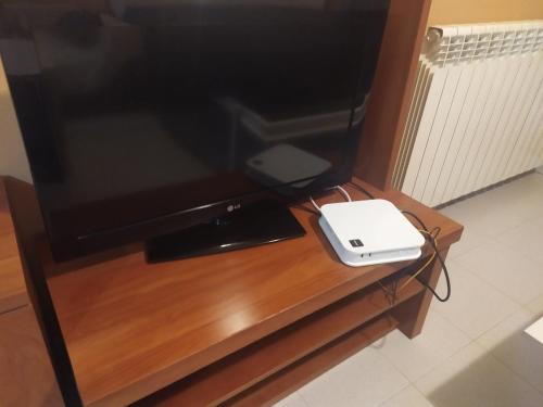 TU CASA EN MEQUINENZA CON WIFI TV 또는 엔터테인먼트 센터