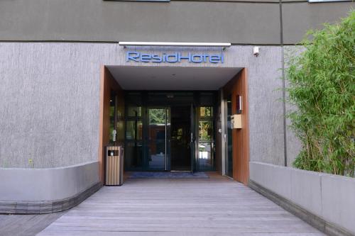 an entrance to a building with a sign that reads regionallite at Residhotel Lyon Lamartine in Tassin-la-Demi-Lune