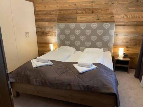 Voodi või voodid majutusasutuse Romantik Apartment mit SommerCard toas