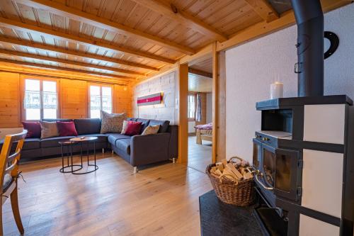 Chalet Rösi - Ferienwohnung mit Hot Pot & Bergsicht