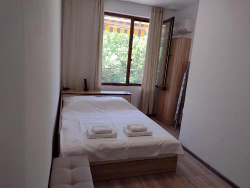 Katil atau katil-katil dalam bilik di Апартамент на къмпинг Градина