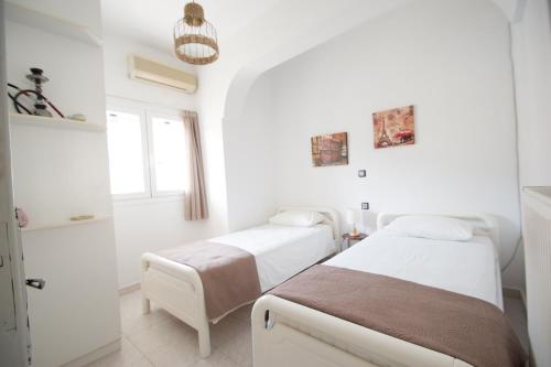 Posteľ alebo postele v izbe v ubytovaní Ionian View Apartment