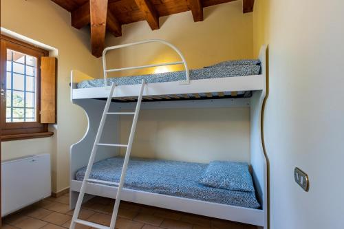 Μία ή περισσότερες κουκέτες σε δωμάτιο στο Il Casale Lonato - by Host4U