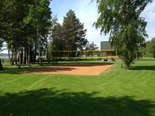a volley ball hoop in a park with trees at Bukdangas in Usma