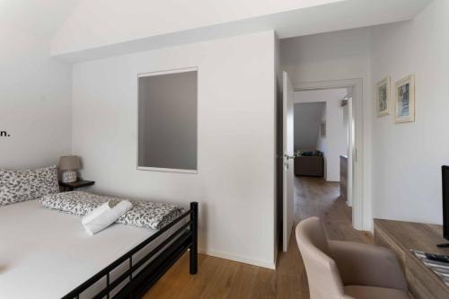 Katil atau katil-katil dalam bilik di Triangle Apartments