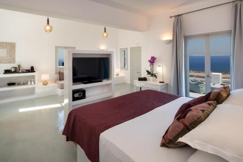 Ένα ή περισσότερα κρεβάτια σε δωμάτιο στο Siete Mares Luxury Suites