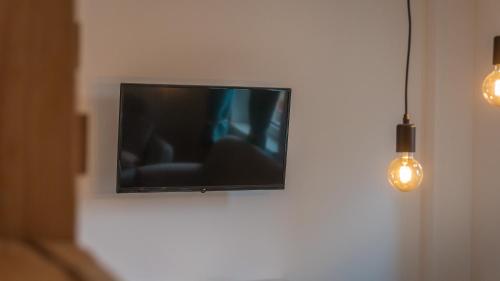TV a/nebo společenská místnost v ubytování Appartementhaus- Bredner / Appartement IV