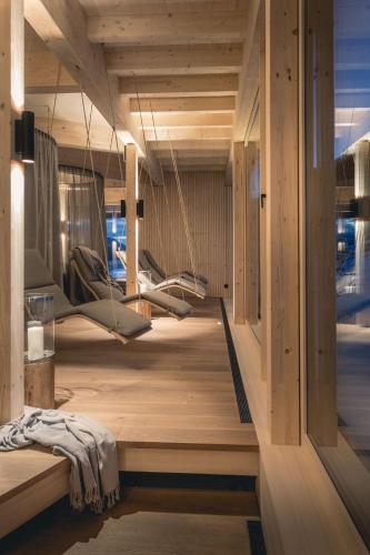 a room with a hammock and swings in it at Torghele's Wald & Fluh in Balderschwang