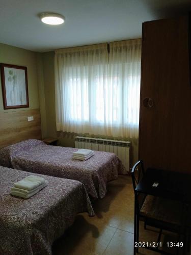 Postel nebo postele na pokoji v ubytování Borja
