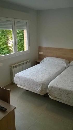 Postel nebo postele na pokoji v ubytování Borja