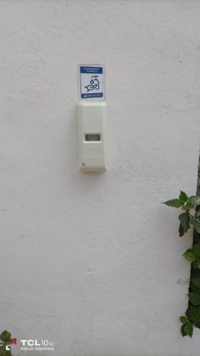 a blue and white sign on a white wall at Apartamento Veracruz - Primera Linea de Playa in Benidorm
