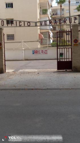 an empty street with a gate and a building at Apartamento Veracruz - Primera Linea de Playa in Benidorm