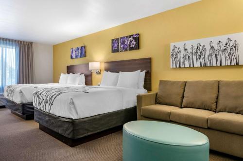 Ένα ή περισσότερα κρεβάτια σε δωμάτιο στο Sleep Inn & Suites Great Falls Airport