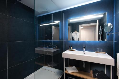 Ванная комната в Hotel Atlantic