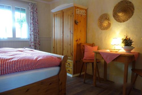 Ένα ή περισσότερα κρεβάτια σε δωμάτιο στο Kanne Cottage Flaire Suite