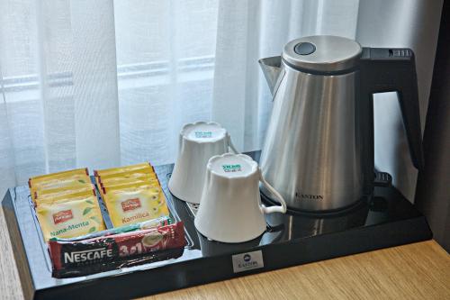 a counter with a coffee maker and a blender on it at OLD TOWN Apartments by Nejra in Sarajevo