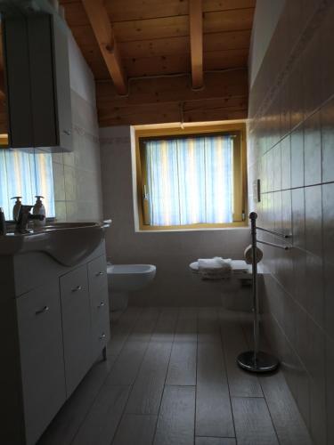 Ванна кімната в Le Ruote