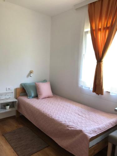 Katil atau katil-katil dalam bilik di Guesthouse D&D