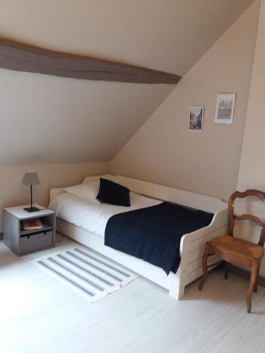 Cama ou camas em um quarto em Escale Au Chiteau