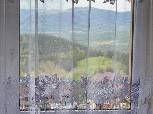 a window with a view of a mountain at Halny Natura Tour in Karpacz
