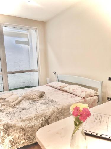 Un ou plusieurs lits dans un hébergement de l'établissement Holiday Home Sovenigo