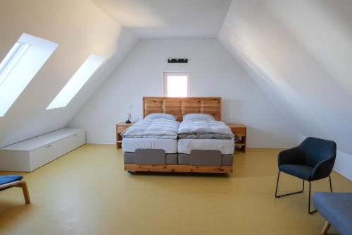 Ein Bett oder Betten in einem Zimmer der Unterkunft Equiliber Reitkunstzentrum Burgenland