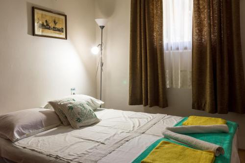 Krevet ili kreveti u jedinici u okviru objekta Apartment & Rooms Aleksandar