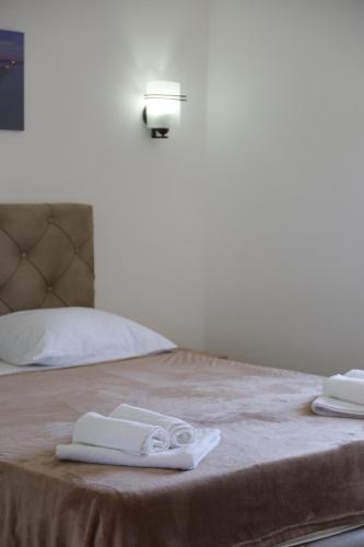 Apartments MASIMOにあるベッド