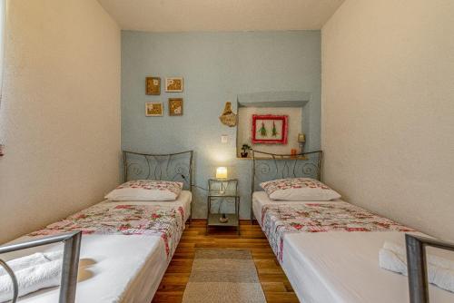 Posteľ alebo postele v izbe v ubytovaní Holiday Home Stone Wall