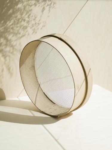 a tennis racket sitting on top of a table at Criu Boutique Hotel in Nicolosi