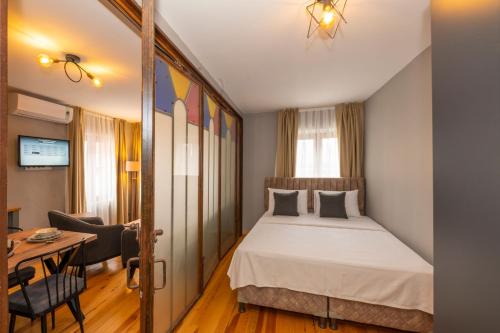 Postel nebo postele na pokoji v ubytování Suites İstanbul