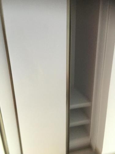 a white refrigerator with its door open at Apartman VeM in Bar