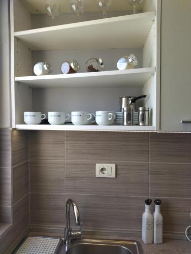 Příslušenství pro přípravu čaje a kávy v ubytování Apartman GANA Altina LUX