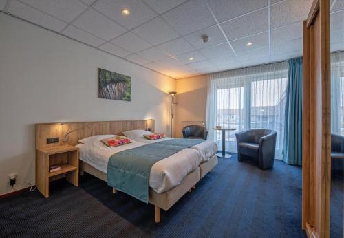 Postel nebo postele na pokoji v ubytování Hotel de Branding