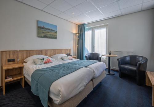 Postel nebo postele na pokoji v ubytování Hotel de Branding