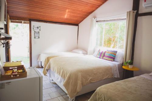 Postel nebo postele na pokoji v ubytování Peniel do Sana Guest House