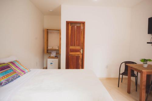Postel nebo postele na pokoji v ubytování Peniel do Sana Guest House