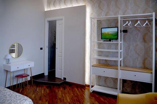 TV a/nebo společenská místnost v ubytování il bastimento