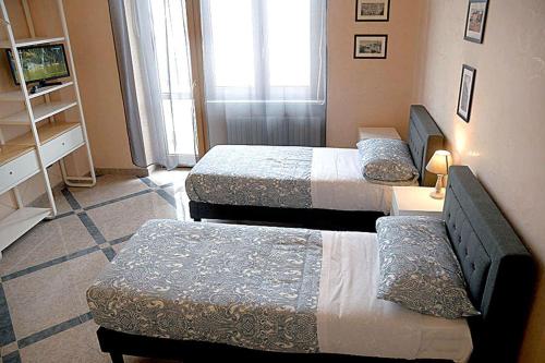 Postel nebo postele na pokoji v ubytování il bastimento