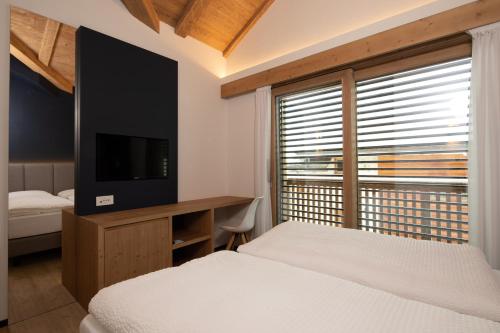 Ένα ή περισσότερα κρεβάτια σε δωμάτιο στο Moon Eco B&B