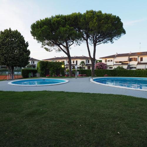 Gallery image of villetta con piscina a due passi dal mare in Duna Verde