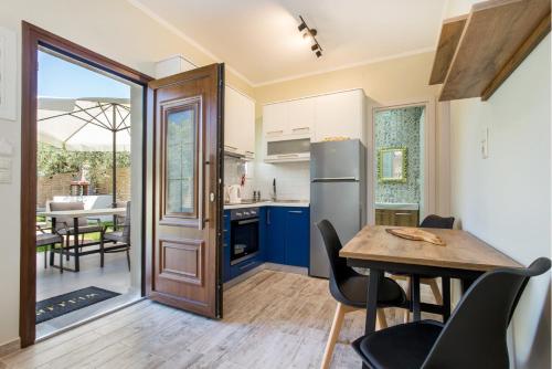 A kitchen or kitchenette at Villa 4 you iliopetra