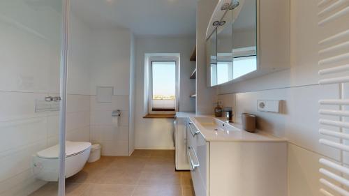 Koupelna v ubytování Lieblingsapartment No.08 mit Blick auf den Rostocker Stadthafen