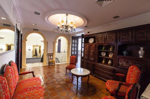 Χώρος καθιστικού στο Hotel Palacio del Intendente