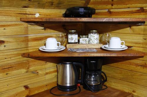Tetera y cafetera en Recanto da Mata Pousada